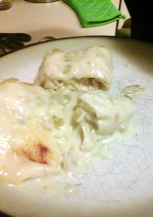 A picture of white chicken enchiladas.