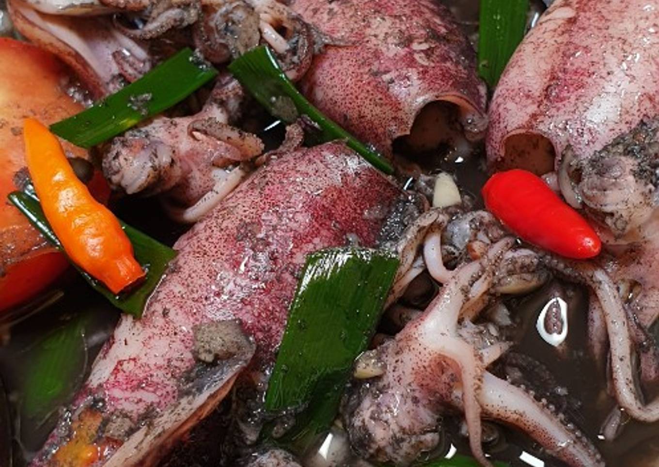 Cumi rebus dengan noda hitam