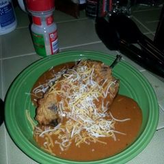 A picture of Yummy Poblano Peppers aka Chili Rillenos with Homemade enchilada sauce! :-).