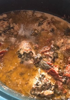 A picture of CROCKPOT TUSCAN GARLIC CHICKEN WITH SPINACH AND SUN-DRIED TOMATOES.
