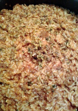 A picture of red ground beef and rice.