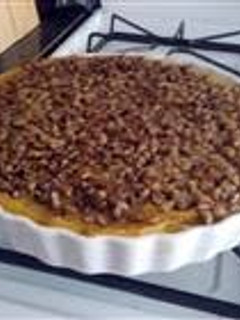 A picture of Squash Casserole with Crunchy Pecan Topping.