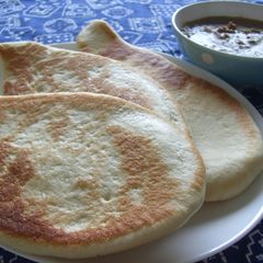 A picture of Cheese Naan Bread.