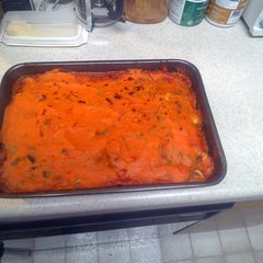 A picture of Shepherd's pie with sweet potatoes.