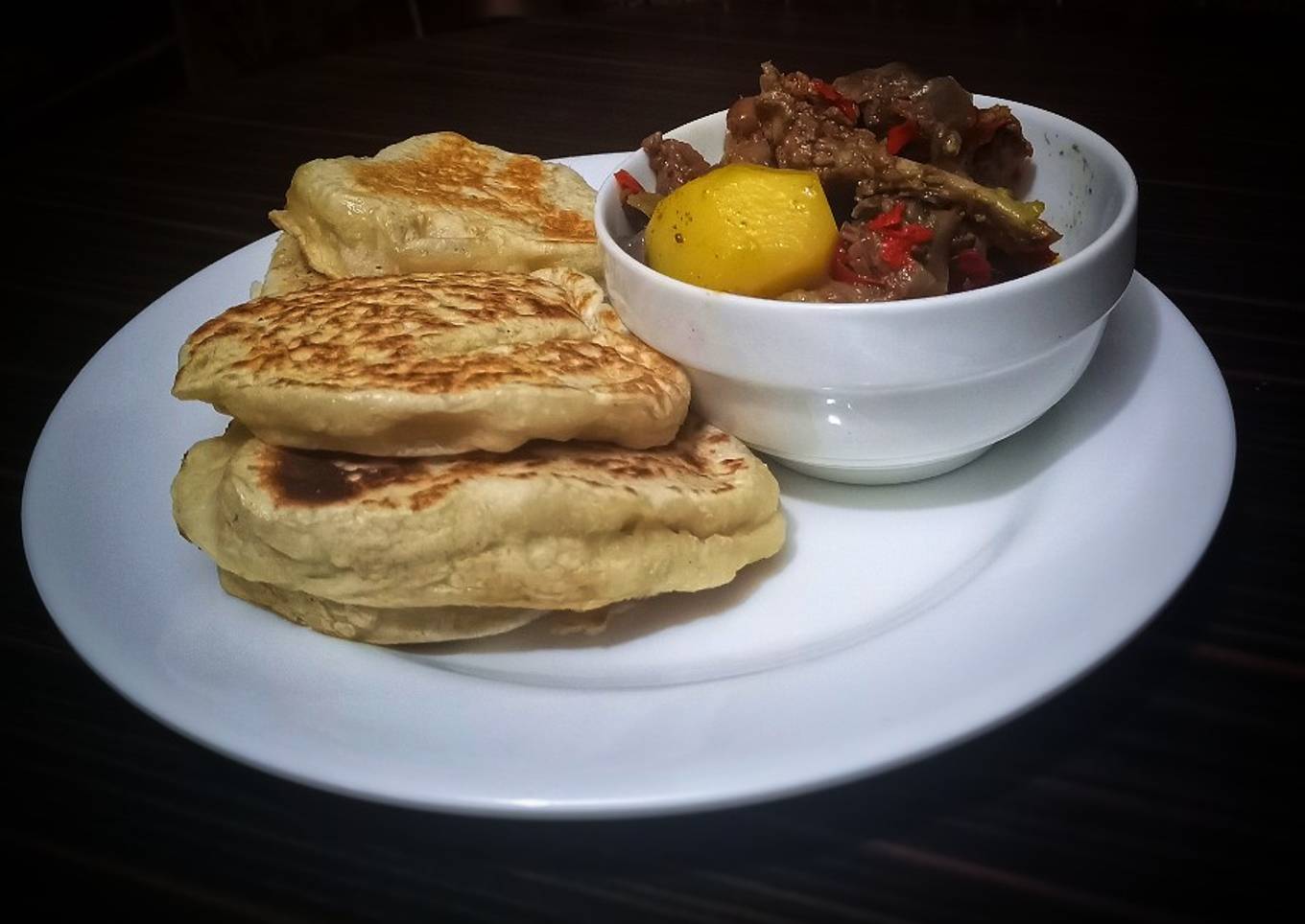 Flat bread with goat meat pepper soup