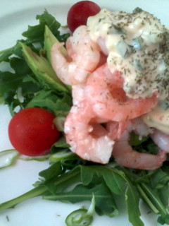 A picture of Prawn cocktail with Rocket and Cucumber dressing.