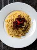 Oil pasta with dried tomatoes and anchovies