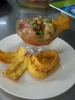 Una foto de Ceviche de Corvina con jengibre y ajonjolí tostado