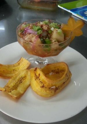 Una foto de Ceviche de Corvina con jengibre y ajonjolí tostado