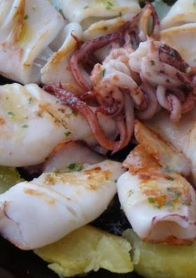 Una foto de Calamares marinados a la plancha