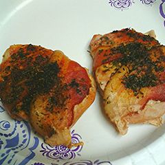 A picture of Herb/spice stuffed and encrusted bacon wrapped pork loin.