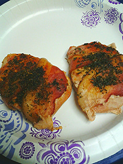 A picture of Herb/spice stuffed and encrusted bacon wrapped pork loin.