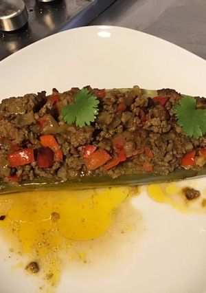 Une photo de Papaye verte au bœuf,poivron rouge,oignon et épices massalé