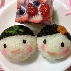 A picture of Hina Doll Prince and Princess Shaped Temari-zushi (round sushi balls).