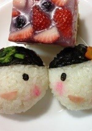 A picture of Hina Doll Prince and Princess Shaped Temari-zushi (round sushi balls).
