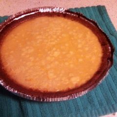 A picture of Egg Nog Custard Pie.