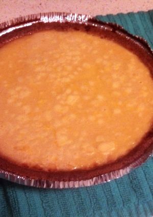 A picture of Egg Nog Custard Pie.