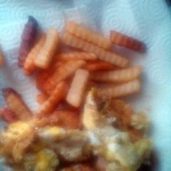 A picture of Breaded Fish fillet covered with Egg.