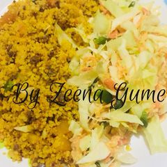 A picture of Fried Couscous (Mixed With Minced Meat) And Coleslaw.