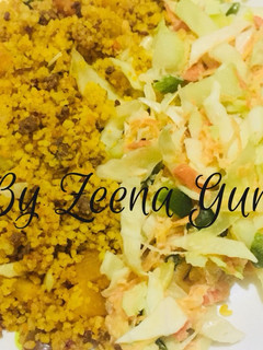 A picture of Fried Couscous (Mixed With Minced Meat) And Coleslaw.