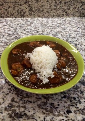 A picture of Abigaile's Étouffée served with rice.