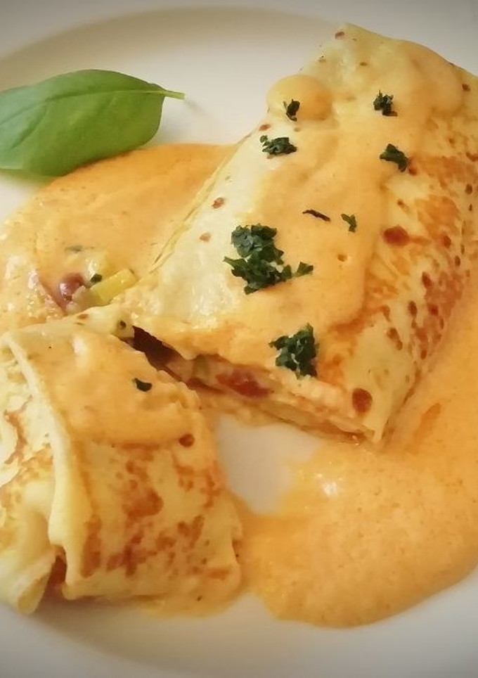 Una foto de Crepes de Setas y Langostinos