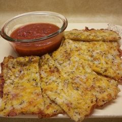 A picture of Cauliflower Cheese "Breadsticks".