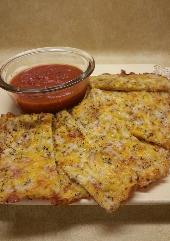A picture of Cauliflower Cheese "Breadsticks".