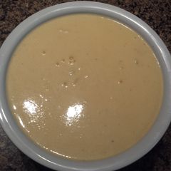 A picture of Cheddar cheese sauce.
