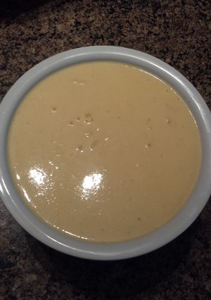 A picture of Cheddar cheese sauce.
