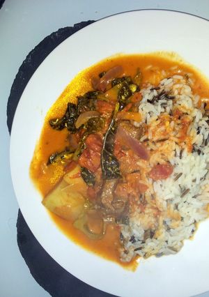 A picture of spicy tomato creamy lamb curry.