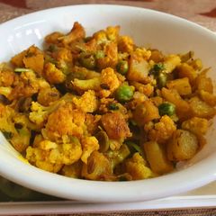 A picture of Cauliflower Potato Peas Dry Vegetable or Sabzi.