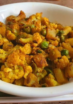 A picture of Cauliflower Potato Peas Dry Vegetable or Sabzi.