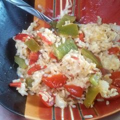 A picture of cheese rice with vegtables.