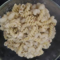 A picture of White sauce cheese pasta.