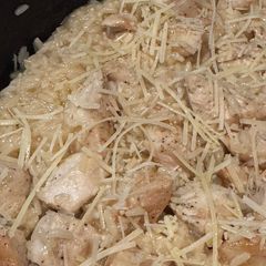 A picture of Chicken Scampi with garlic Parmesan rice.