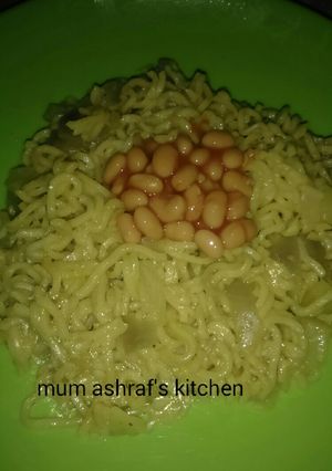 A picture of Indomie with baked beans.
