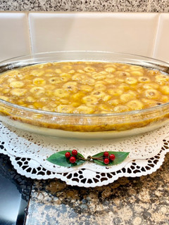 Una foto de Postre cremoso con plátano caramelizado
