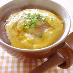 A picture of Surprising Crab Omelet over Rice.