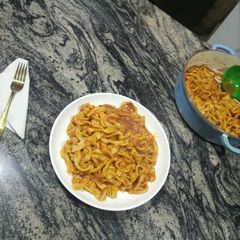 A picture of Fresh Noodles with Ragu sauce.