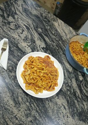 A picture of Fresh Noodles with Ragu sauce.