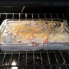A picture of Chicken Enchiladas with Sour Cream Sauce.