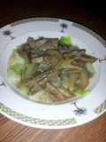 smothered thin steak over cabbage