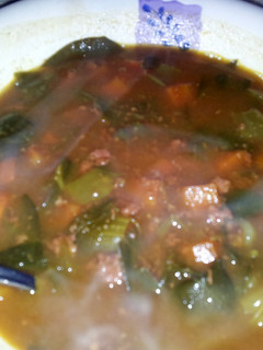 A picture of corned beef and cabbage soup..