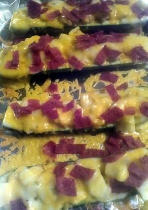 A picture of Stuffed zucchini with Cheese.