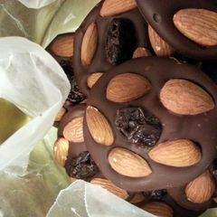 A picture of Chocolate, Cherry, Almond snacks (paleo, vegan, gluten free sweet treat).