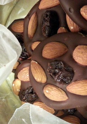 A picture of Chocolate, Cherry, Almond snacks (paleo, vegan, gluten free sweet treat).