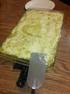 A picture of Green chicken enchiladas.