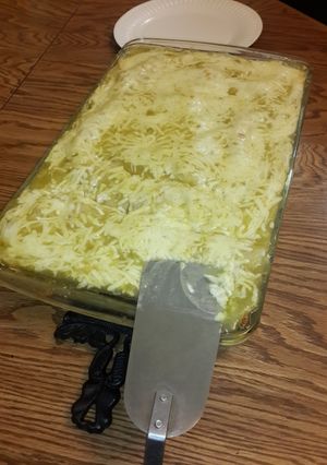 A picture of Green chicken enchiladas.