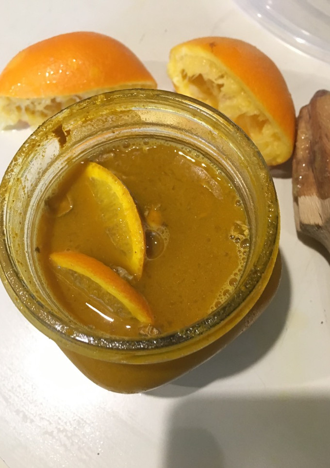 Una foto de Jarabe de Naranja-Cúrcuma-Jengibre